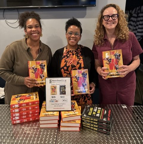 (L to R) Stephanie Planchart of Rozzie Bound Co-Op Bookstore; Tamryn Spruill, author of The W: A History of the WNBA; and Amy Littlefield, author of The Killers of Roe at Spruill’s book launch event on September 23, 2026, at Distraction Brewery Co., in Roslindale, MA. | Photo credit: Dani Shaw/kaleidaweb. (L to R) Stephanie Planchart of Rozzie Bound Co-Op Bookstore; Tamryn Spruill, author of The W: A History of the WNBA; and Amy Littlefield, author of The Killers of Roe at Spruill's book launch event on September 23, 2026, at Distraction Brewery Co., in Roslindale, MA. | Photo credit: Dani Shaw/kaleidaweb.